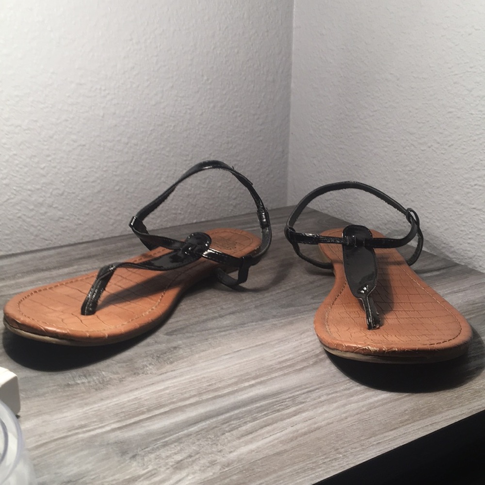 tan and black sandals